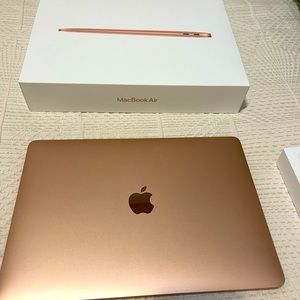 Rose Gold New in box Mac Book